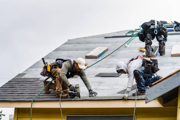 Professional Roofing technician working in North Attleboro, MA
